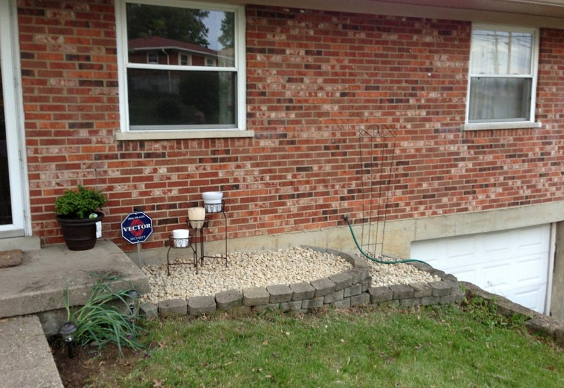 flower bed turned rock garden