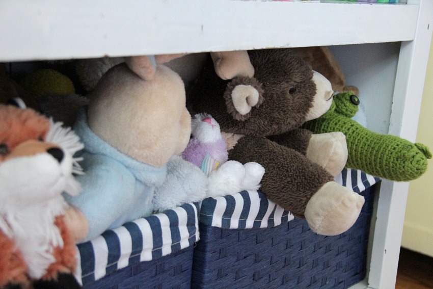 stuffed animals in baskets