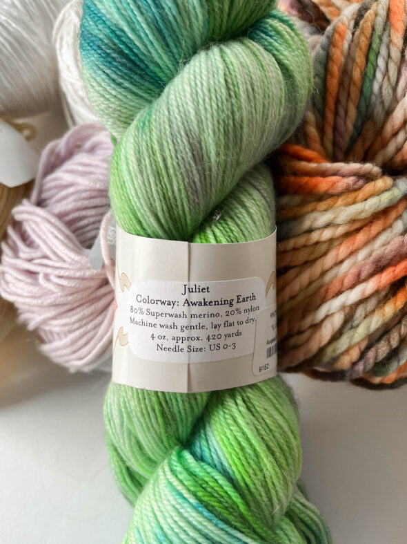 Yarn Love yarn label for Juliet yarn in the Awakening Earth colorway